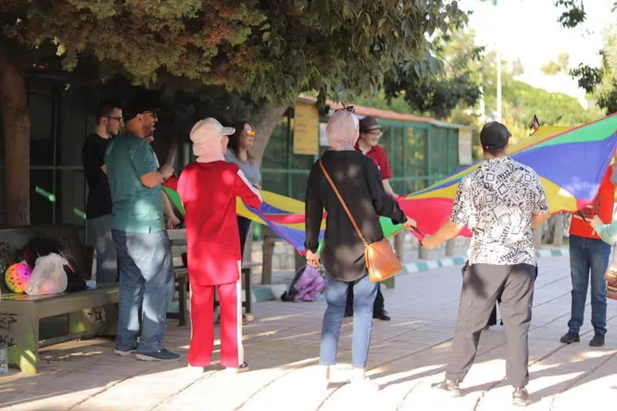 A community-engagement activity in an outdoor park.