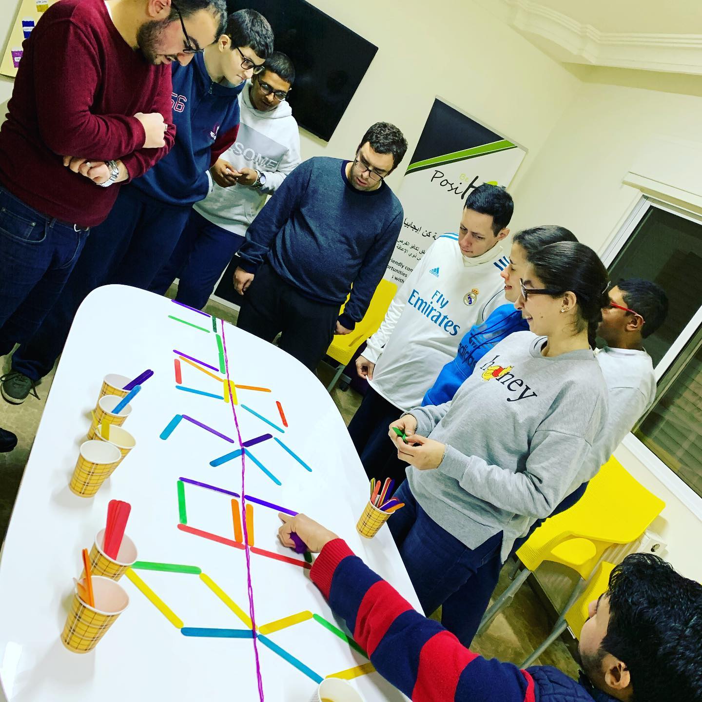 Participants in a creative workshop at Be Positive.